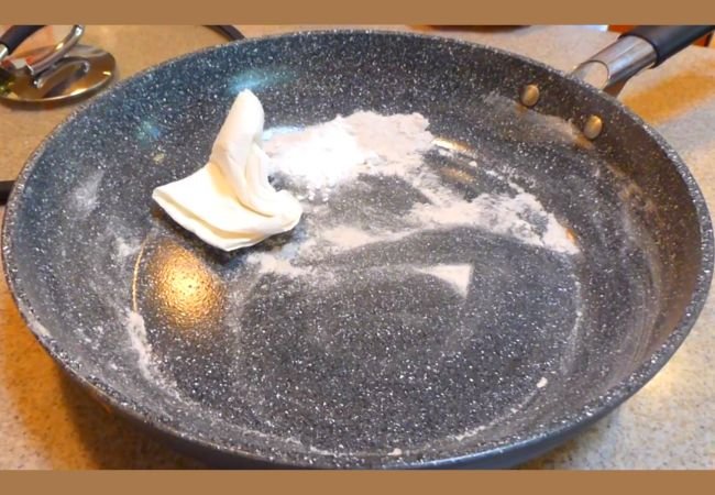 clean a marble-coated pan